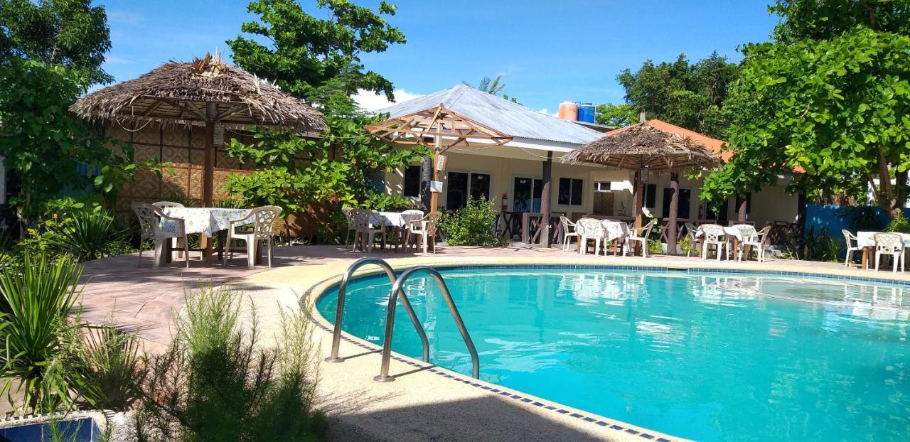 เดอะ ชาร์กส์ เทล ไดฟ์เซ็นเตอร์ Hotel Daanbantayan ภายนอก รูปภาพ