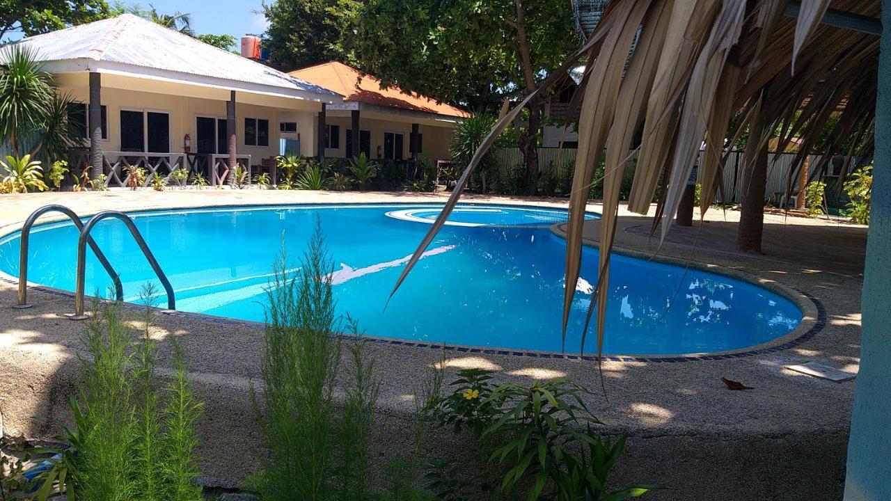เดอะ ชาร์กส์ เทล ไดฟ์เซ็นเตอร์ Hotel Daanbantayan ภายนอก รูปภาพ