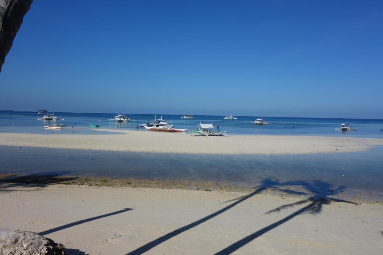 เดอะ ชาร์กส์ เทล ไดฟ์เซ็นเตอร์ Hotel Daanbantayan ภายนอก รูปภาพ