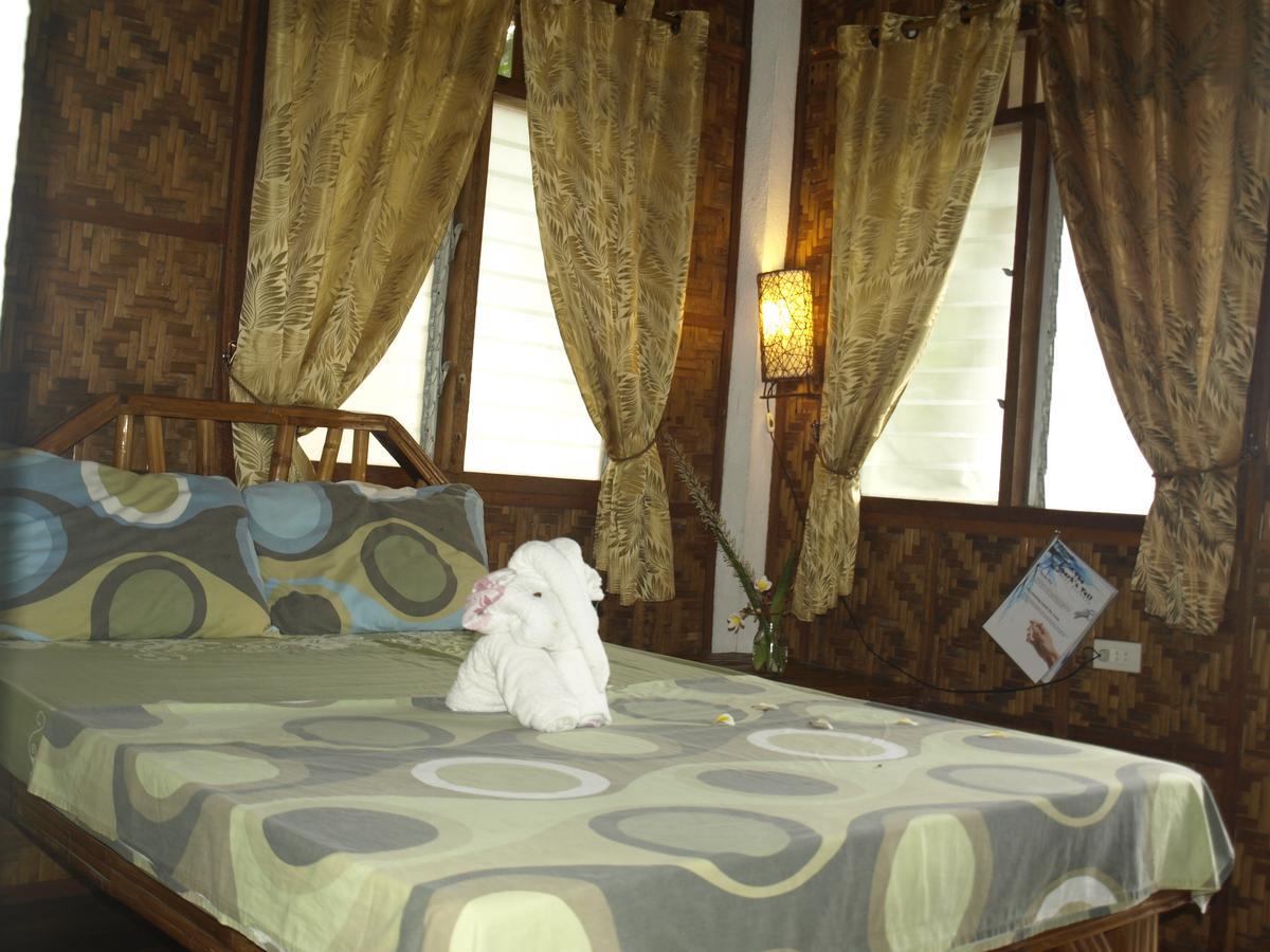 เดอะ ชาร์กส์ เทล ไดฟ์เซ็นเตอร์ Hotel Daanbantayan ภายนอก รูปภาพ