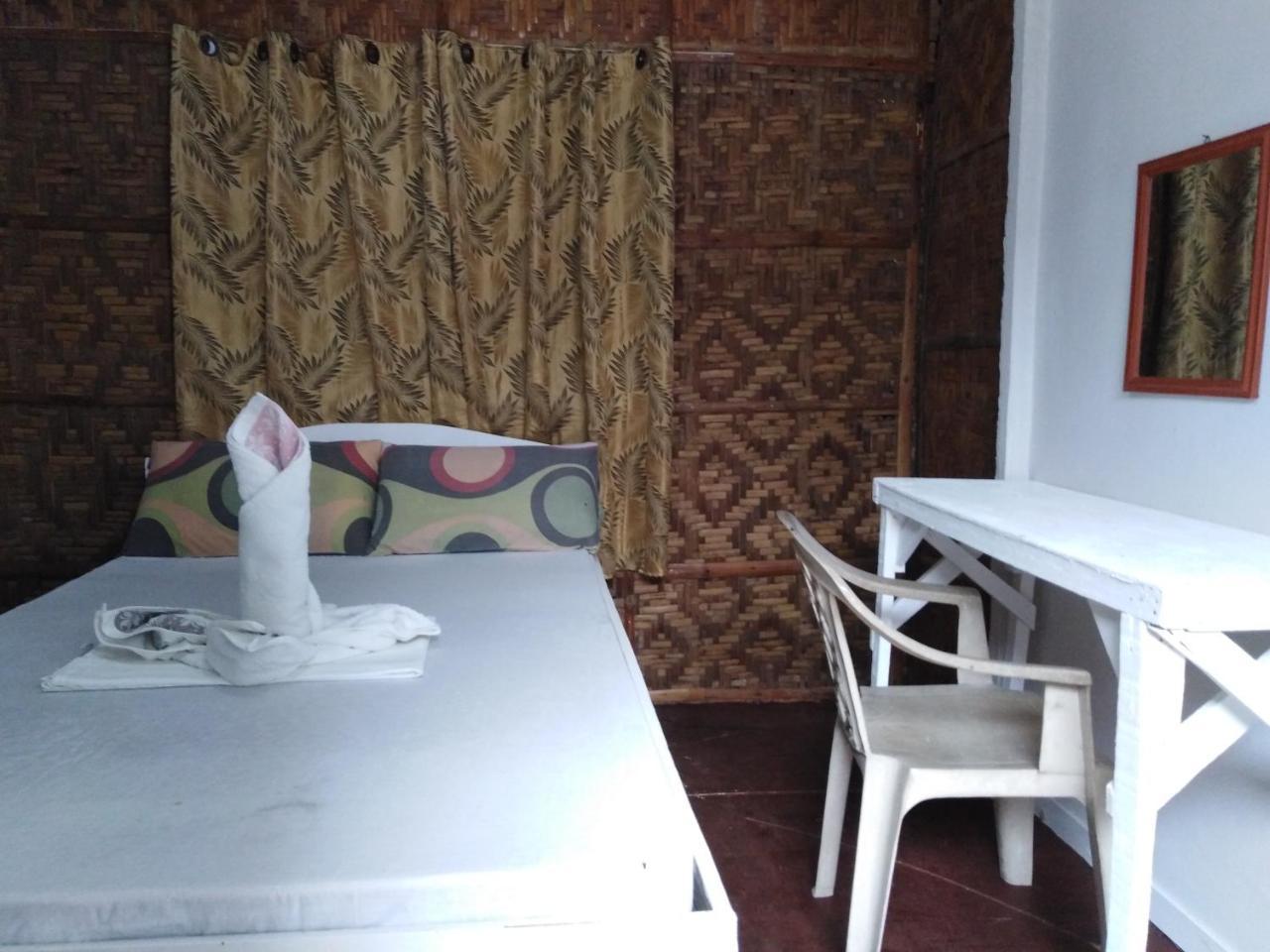 เดอะ ชาร์กส์ เทล ไดฟ์เซ็นเตอร์ Hotel Daanbantayan ภายนอก รูปภาพ